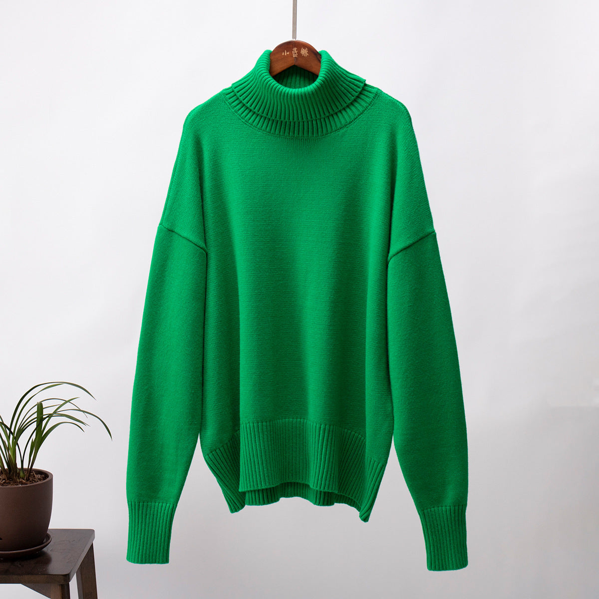 Paula - Suéter verde de cuello alto oversize para mujer