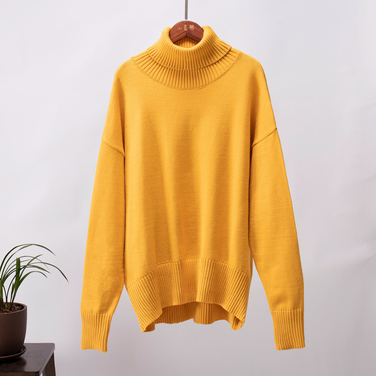 Paula - Suéter verde de cuello alto oversize para mujer