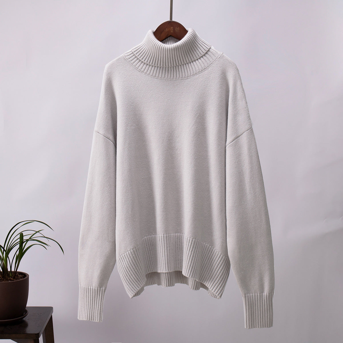 Paula - Suéter verde de cuello alto oversize para mujer
