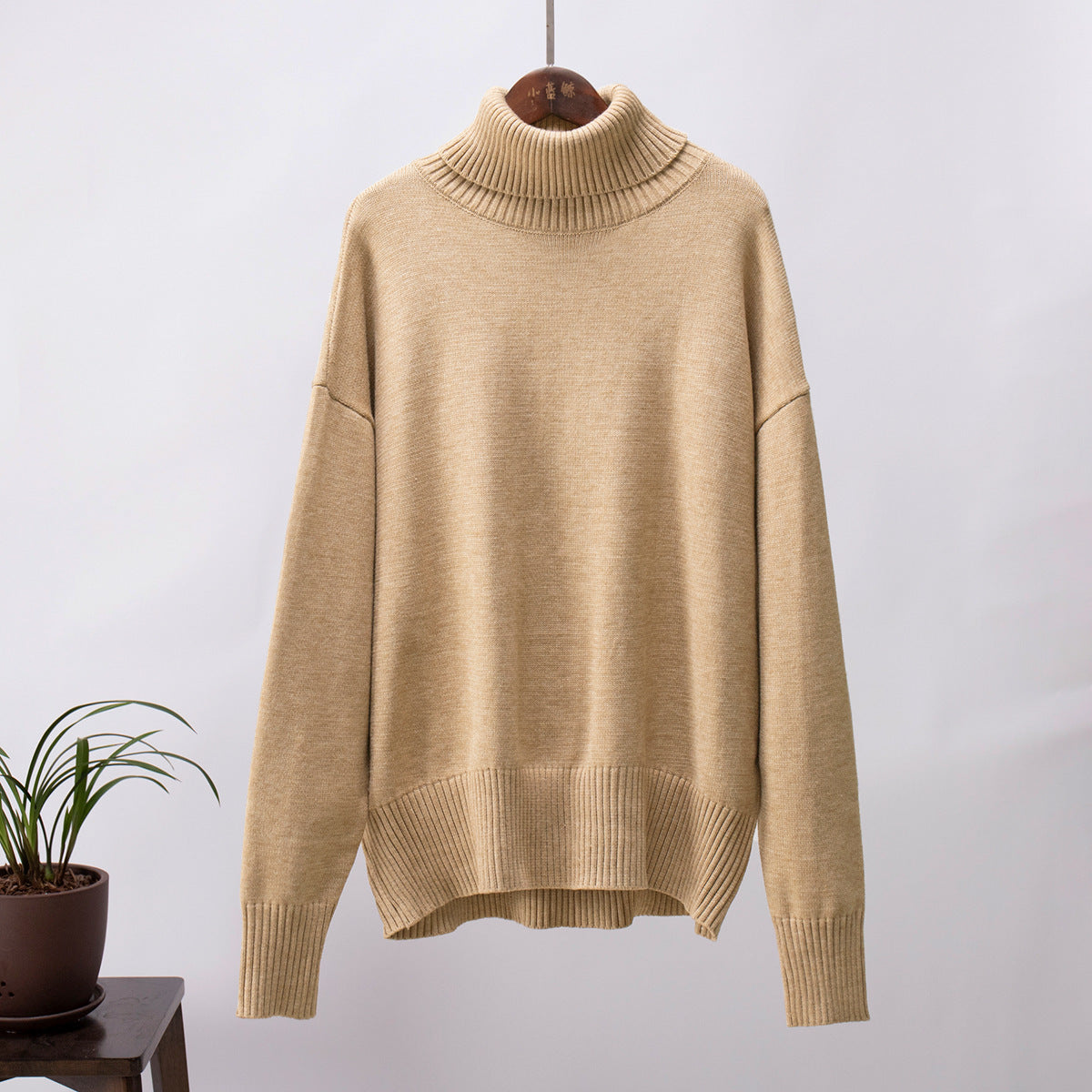Paula - Suéter verde de cuello alto oversize para mujer